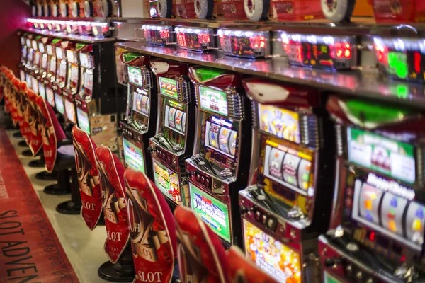 Mobile phone showing Pretty Gaming table selection and game options on 1xbet ng